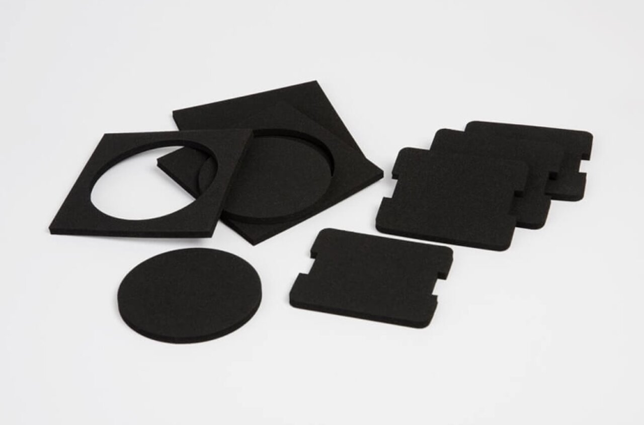 Vibration absorbers made of cellular rubber for vehicle construction