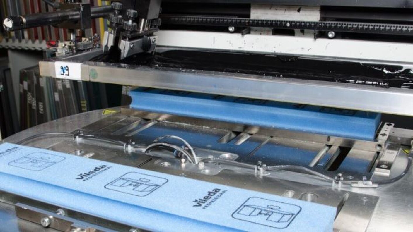 Depending on the material or substrate, we use a screen printing system with rotary table