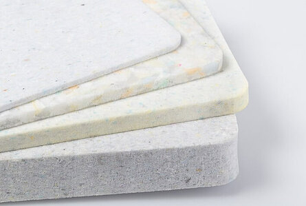 Composite materials are produced on the basis of recycled PUR flexible foam